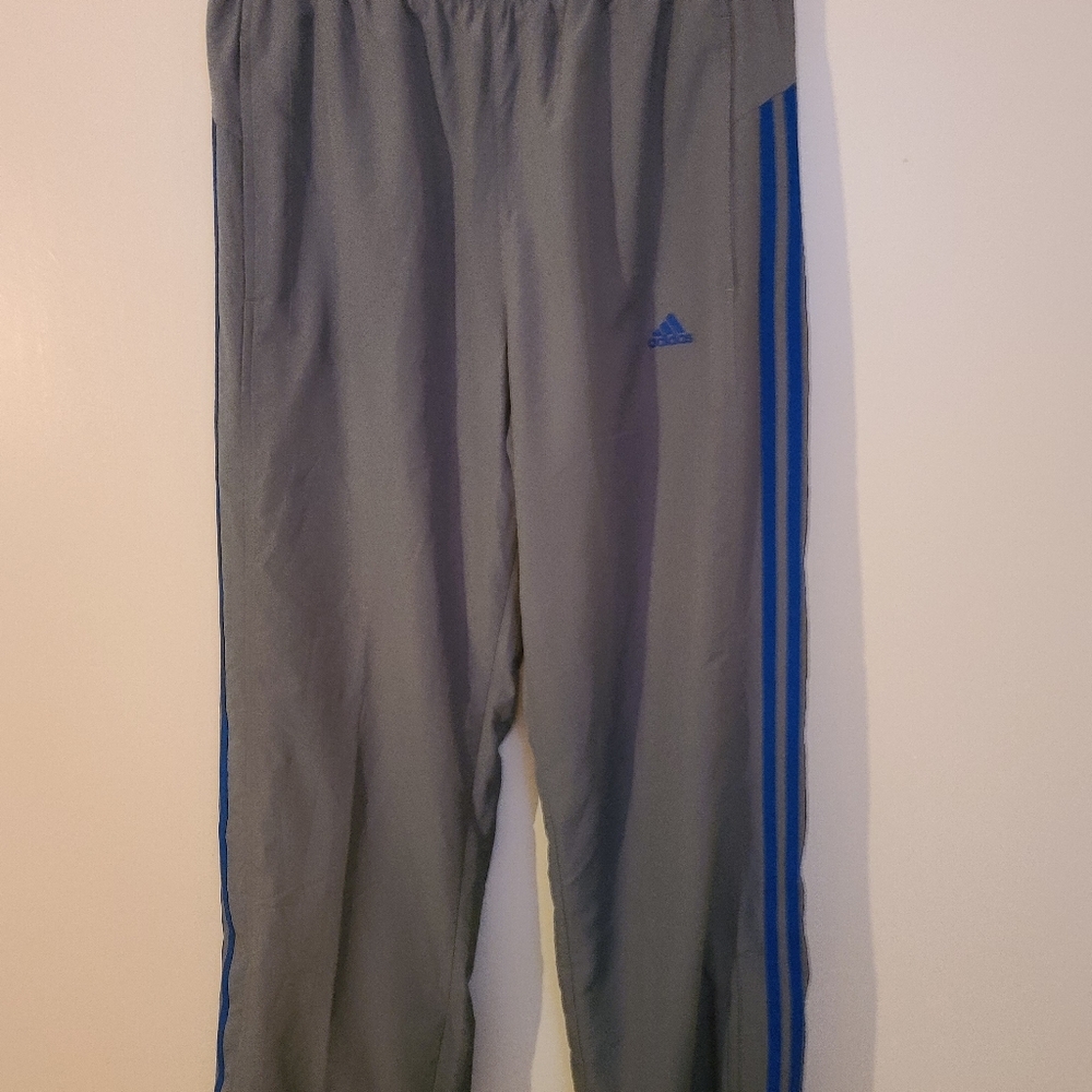 Men's Adidas climaproof Track pants medium. Zipper bottoms Grey and blue.